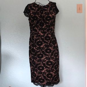 NWT Black lace dress with beige lining.